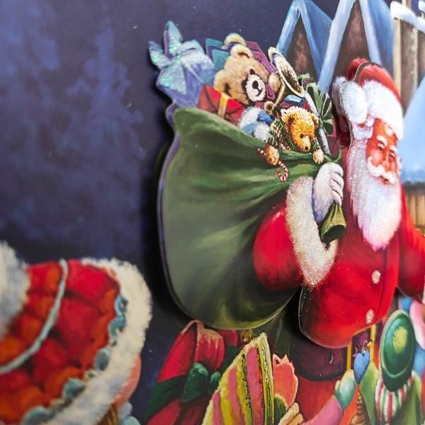 Χριστουγεννιάτικη Τσάντα Δώρου Χάρτινη Άγιος Βασίλης 4 Σχέδια 26x32x10cm